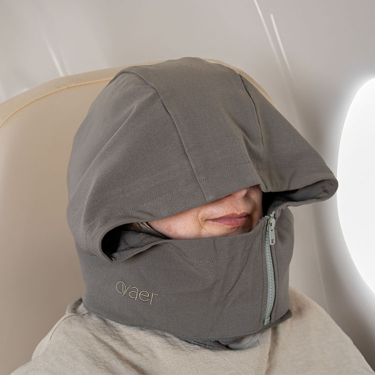 Neck pillow outlet with hood