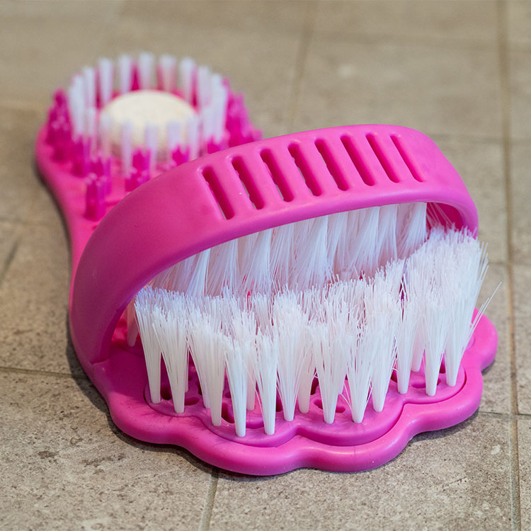 Foot brush for the shower