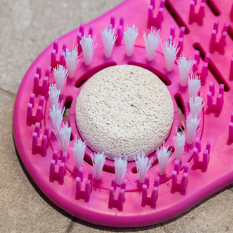 Foot brush for the shower