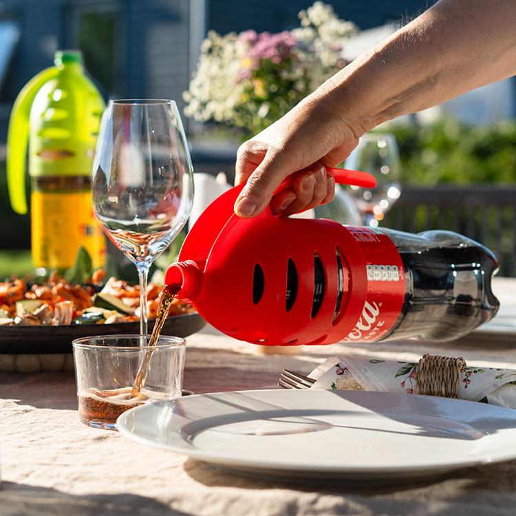 Grip holders for plastic bottles