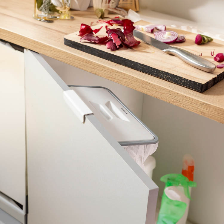 Food waste bag holder for cupboards