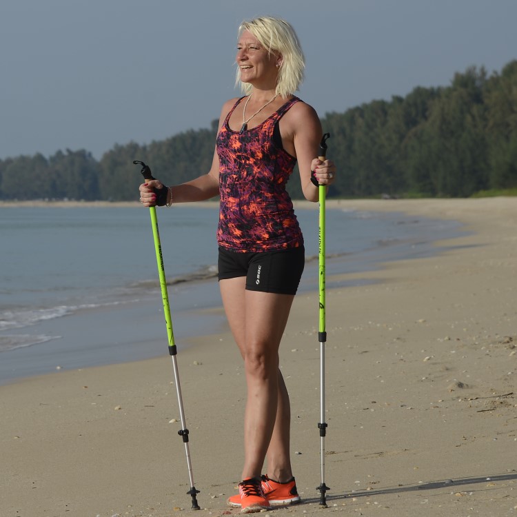 Nordic walking poles with suspension