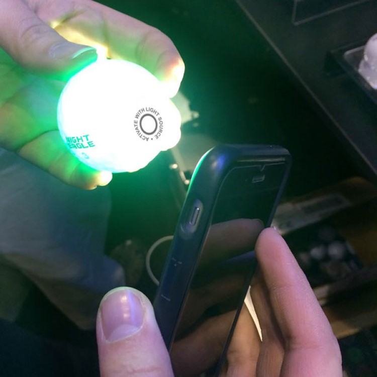 Light-activated glowing golf balls