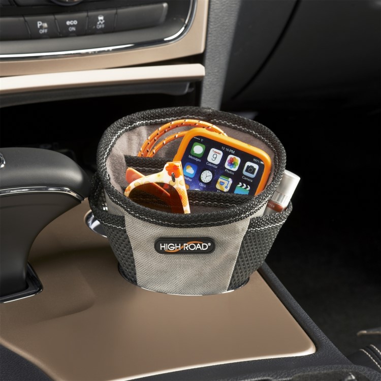 Storage pocket for the cup holder