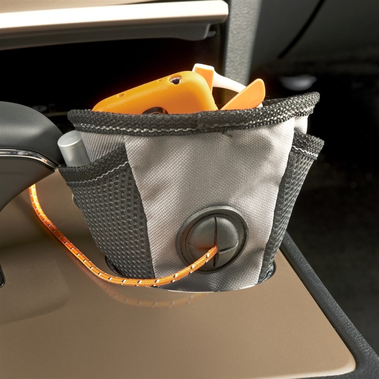 Storage pocket for the cup holder