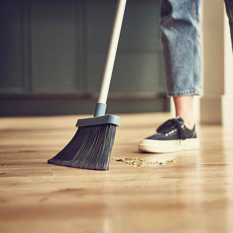 Broom with holder and wall bracket