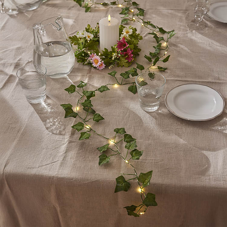 Battery operated light string with ivy