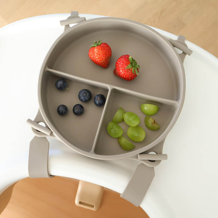 Children's plate with suction cup and strap