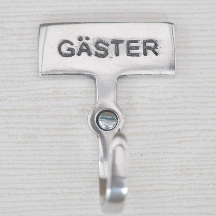 Hook with sign, GÄSTER, Exmez, Sand-cast aluminum